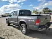 2003 Dodge Dakota Sport with VIN 1D7HG38X03S227575, listed as a Copart auction lot 76103394 with 109,796 mi miles and Salvage title. Bid and sale history available at DreamBid. Image 2.