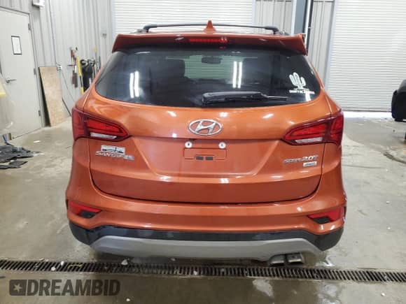 2018 Hyundai Santa Fe 2.0T with VIN 5XYZUDLA0JG516670, listed as a Copart auction lot 70360705 with 157,869 mi miles and Salvage title. Bid and sale history available at DreamBid. Image 6.