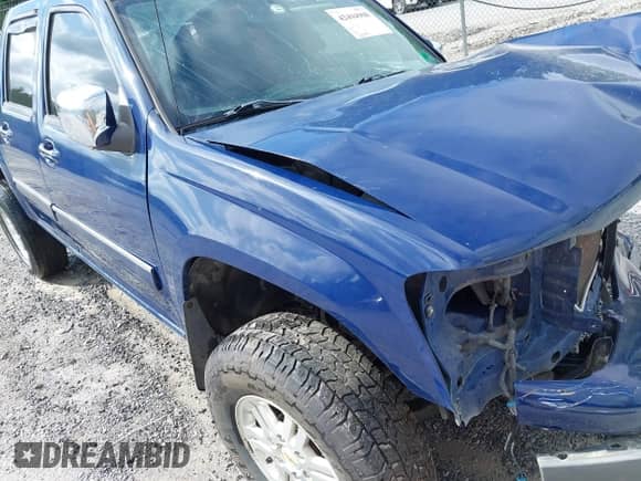 2011 Chevrolet Colorado 1LT z VIN 1GCHTCFE5B8124302, wystawiony jako IAAI lot #42494908 z przebiegiem 121 194 mil mil oraz . Historia ofert i sprzedaży dostępna na DreamBid. Obrazek 18.