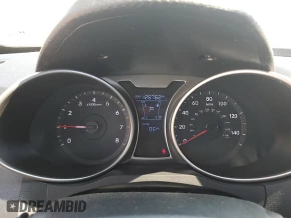 2013 Hyundai Veloster w/Black Int z VIN KMHTC6AD2DU099052, wystawiony jako Copart lot #60487975 z przebiegiem 126 762 mil mil oraz Czysty tytuł • Clean title. Historia ofert i sprzedaży dostępna na DreamBid. Obrazek 9.