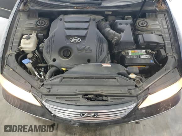 2009 Hyundai Azera Limited с VIN KMHFC46F29A341228, выставлен на аукционе Copart как лот 55204355 с пробегом 156 251 миль миль и Списание • Salvage title. История ставок и продаж доступна на DreamBid. Изображение 11.