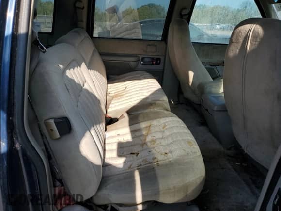 1994 Chevrolet Suburban with VIN 1GNEC16K1RJ410333, listed as a Copart auction lot 84595075 with 311,147 mi miles and Salvage title. Bid and sale history available at DreamBid. Image 11.