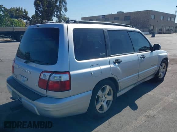 2002 Subaru Forester S with VIN JF1SF65642H705305, listed as a IAAI auction lot 43214359 with Not provided miles and . Bid and sale history available at DreamBid. Image 4.