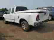 2000 Ford F-150 XL with VIN 1FTRX18W3YNA83990, listed as a Copart auction lot 59264145 with Not provided miles and Salvage title. Bid and sale history available at DreamBid. Image 2.