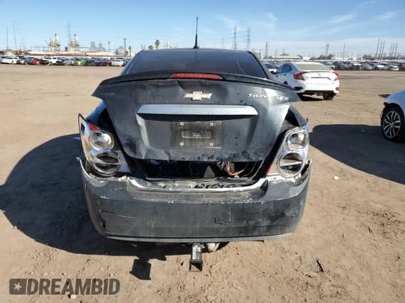 2013 Chevrolet Sonic LTZ с VIN 1G1JE5SH7D4226596, выставлен на аукционе Copart как лот 40272184 с пробегом 150 981 миль миль и Списание • Salvage title. История ставок и продаж доступна на DreamBid. Изображение 6.