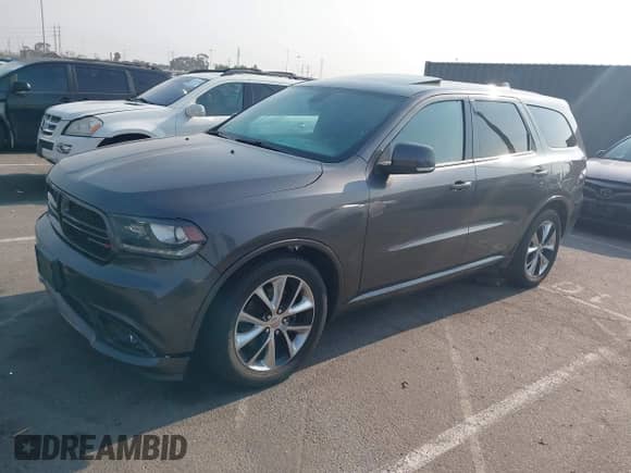 2014 Dodge Durango R/T with VIN 1C4SDHCT1EC405517, listed as a IAAI auction lot 42900132 with 141,872 mi miles and . Bid and sale history available at DreamBid. Image 2.