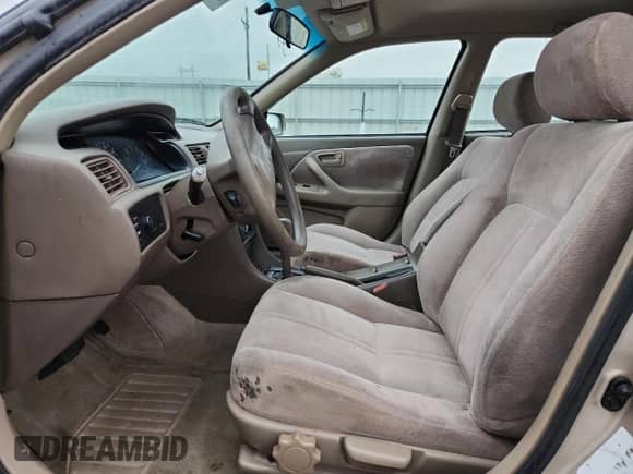 1997 Toyota Camry LE z VIN JT2BF22K5V0081756, wystawiony jako Copart lot #85339105 z przebiegiem 246 439 mil mil oraz Szkoda całkowita • Salvage title. Historia ofert i sprzedaży dostępna na DreamBid. Obrazek 7.