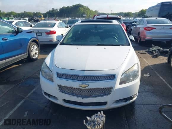 2012 Chevrolet Malibu LTZ 1LZ z VIN 1G1ZE5E09CF176036, wystawiony jako IAAI lot #42863415 z przebiegiem 250 728 mil mil oraz . Historia ofert i sprzedaży dostępna na DreamBid. Obrazek 11.