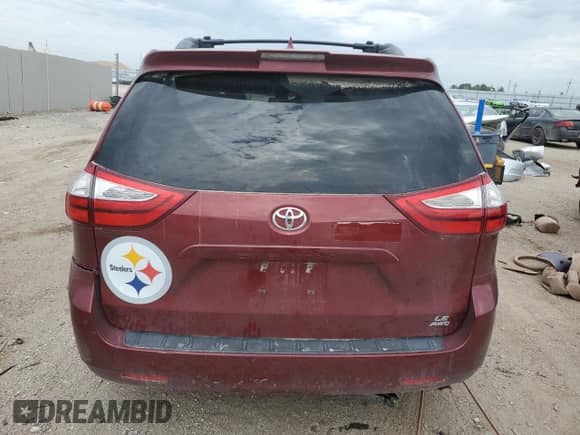 2018 Toyota Sienna LE with VIN 5TDJZ3DC7JS200498, listed as a Copart auction lot 80458855 with 105,783 mi miles and Salvage title. Bid and sale history available at DreamBid. Image 6.
