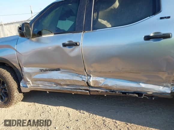 2024 Toyota Tundra SR5 with VIN 5TFLA5DB6RX163405, listed as a IAAI auction lot 43237590 with 54,123 mi miles and . Bid and sale history available at DreamBid. Image 14.