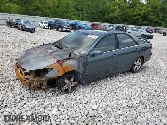 2002 Toyota Camry LE с VIN 4T1BE32K92U502491, выставлен на аукционе Copart как лот 89493885 с пробегом Не указан миль и Списание • Salvage title. История ставок и продаж доступна на DreamBid. Изображение 1.