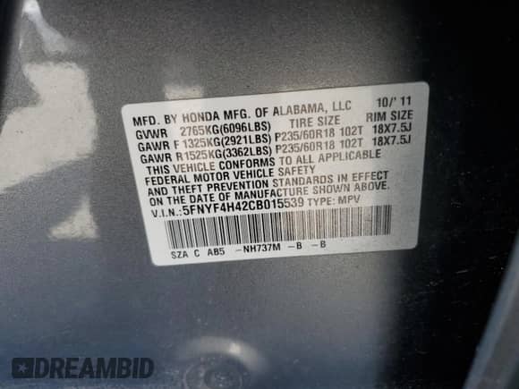 2012 Honda Pilot EX with VIN 5FNYF4H42CB015539, listed as a Copart auction lot 71696565 with 142,254 mi miles and Salvage title. Bid and sale history available at DreamBid. Image 13.