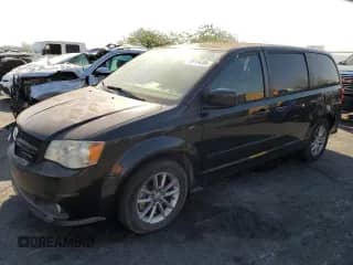 2013 Dodge Grand Caravan R/T with VIN 2C4RDGEG2DR810882, listed as a Copart auction lot 68159505 with 148,592 mi miles and Salvage title. Bid and sale history available at DreamBid. Image 1.