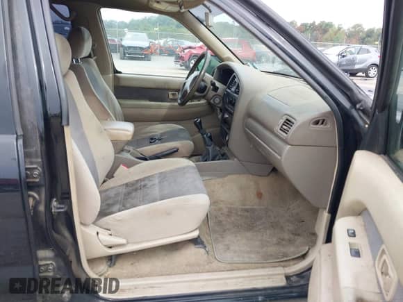 2001 Nissan Pathfinder SE z VIN JN8DR07Y01W502836, wystawiony jako IAAI lot #43290556 z przebiegiem 175 075 mil mil oraz . Historia ofert i sprzedaży dostępna na DreamBid. Obrazek 5.