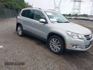 2011 Volkswagen Tiguan S with VIN WVGBV7AX0BW514599, listed as a IAAI auction lot 43051133 with 124,921 mi miles and . Bid and sale history available at DreamBid. Image 1.
