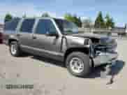1999 Chevrolet Tahoe with VIN 1GNEC13R8XJ487702, listed as a Copart auction lot 67089185 with 167,342 mi miles and Salvage title. Bid and sale history available at DreamBid. Image 4.
