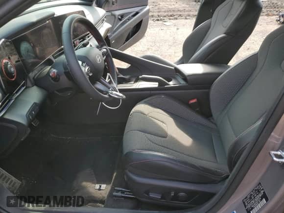 2024 Hyundai Elantra N Line z VIN KMHLR4DF0RU737208, wystawiony jako Copart lot #55430165 z przebiegiem 8 626 mil mil oraz Szkoda całkowita • Salvage title. Historia ofert i sprzedaży dostępna na DreamBid. Obrazek 7.