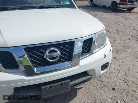 2016 Nissan Frontier SV z VIN 1N6AD0EV5GN795909, wystawiony jako IAAI lot #43356457 z przebiegiem 148 664 mil mil oraz . Historia ofert i sprzedaży dostępna na DreamBid. Obrazek 19.