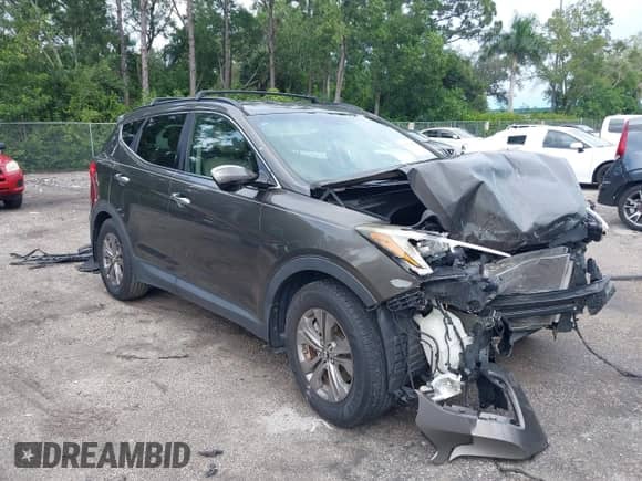 2014 Hyundai Santa Fe with VIN 5XYZU3LB0EG217513, listed as a IAAI auction lot 43183935 with Not provided miles and . Bid and sale history available at DreamBid. Image 1.