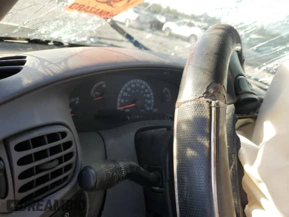 2002 Ford F-150 XL с VIN 2FTRF18W12CA41575, выставлен на аукционе Copart как лот 75248554 с пробегом Не указан миль и Списание • Salvage title. История ставок и продаж доступна на DreamBid. Изображение 9.