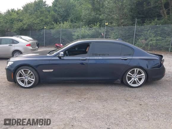 2014 BMW 7 Series ALPINA B7 xDrive with VIN WBAYF8C52ED141754, listed as a IAAI auction lot 42891242 with 108,308 mi miles and . Bid and sale history available at DreamBid. Image 15.