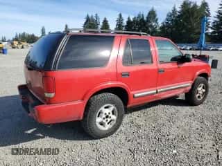 2000 Chevrolet Blazer LT z VIN 1GNDT13W4Y2238584, wystawiony jako Copart lot #74319014 z przebiegiem 171 205 mil mil oraz Szkoda całkowita • Salvage title. Historia ofert i sprzedaży dostępna na DreamBid. Obrazek 3.