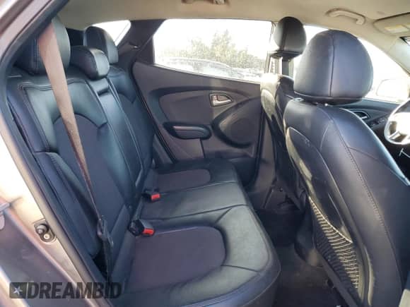 2012 Hyundai Tucson Limited with VIN KM8JUCAC1CU373270, listed as a Copart auction lot 42258475 with 148,388 mi miles and Salvage title. Bid and sale history available at DreamBid. Image 11.