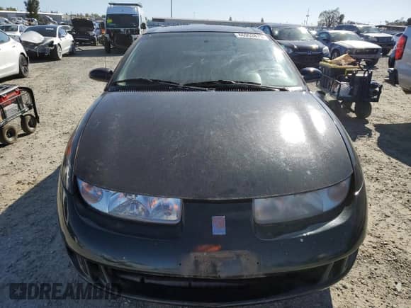 1997 Saturn SC with VIN 1G8ZF1286VZ266912, listed as a Copart auction lot 46953875 with 149,017 mi miles and Salvage title. Bid and sale history available at DreamBid. Image 5.