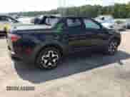 2022 Hyundai Santa Cruz Limited с VIN 5NTJEDAF5NH029327, выставлен на аукционе Copart как лот 68813865 с пробегом Не указан миль и Списание • Salvage title. История ставок и продаж доступна на DreamBid. Изображение 3.
