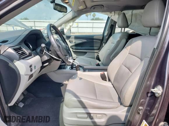 2017 Honda Pilot EX-L with VIN 5FNYF5H88HB013682, listed as a Copart auction lot 59129175 with 169,461 mi miles and Salvage title. Bid and sale history available at DreamBid. Image 7.