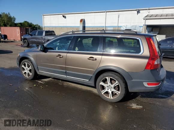 2013 Volvo XC70 T6 с VIN YV4902BZ4D1163553, выставлен на аукционе Copart как лот 69815045 с пробегом 136 462 миль миль и Списание • Salvage title. История ставок и продаж доступна на DreamBid. Изображение 2.