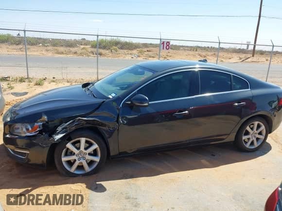 2016 Volvo S60 T5 Drive-E Premier z VIN YV126MFK4G2409957, wystawiony jako IAAI lot #41993257 z przebiegiem 102 420 mil mil oraz . Historia ofert i sprzedaży dostępna na DreamBid. Obrazek 14.