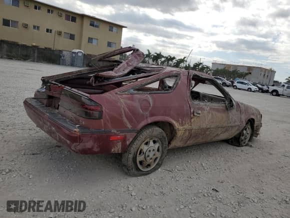 1988 Dodge Daytona with VIN 1B3CA44K0JG328039, listed as a Copart auction lot 80915124 with Not provided miles and Non repairable. Bid and sale history available at DreamBid. Image 3.