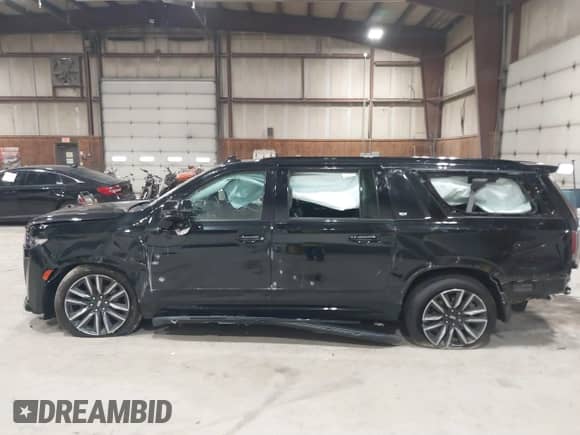 2023 Cadillac Escalade ESV 4WD Sport Platinum with VIN 1GYS4RKL1PR156900, listed as a IAAI auction lot 41740946 with 99,999 mi miles and . Bid and sale history available at DreamBid. Image 14.