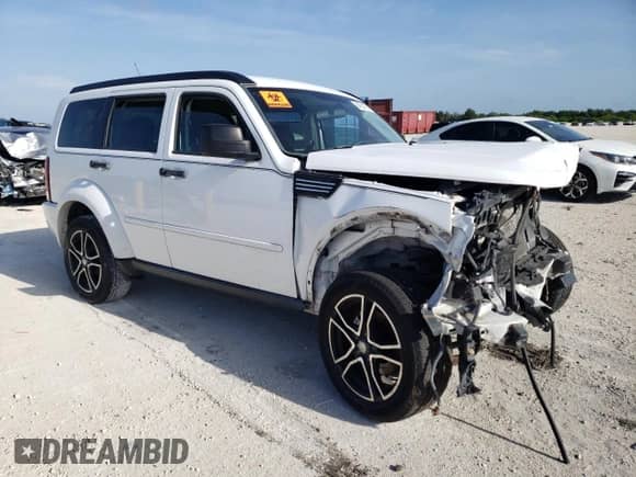 2011 Dodge Nitro SE with VIN 1D4PT2GK3BW520236, listed as a Copart auction lot 64354194 with Not provided miles and Salvage title. Bid and sale history available at DreamBid. Image 4.