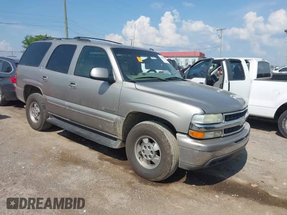 2003 Chevrolet Tahoe LT with VIN 1GNEC13Z13R265773, listed as a IAAI auction lot 42585477 with 229,851 mi miles and . Bid and sale history available at DreamBid. Image 1.