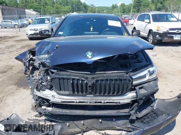 2021 BMW 5 Series 540i xDrive with VIN WBA73BJ0XMWX05467, listed as a IAAI auction lot 42543462 with 73,968 mi miles and . Bid and sale history available at DreamBid. Image 12.