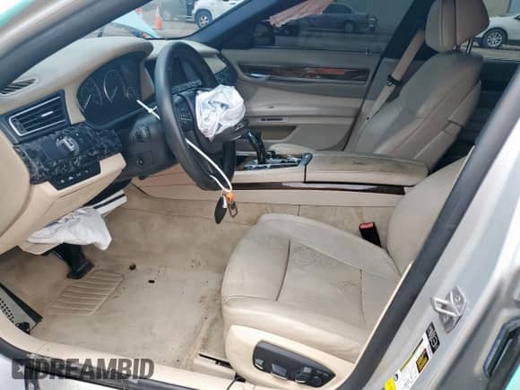 2013 BMW 7 Series 750i z VIN WBAYA8C58DD227809, wystawiony jako Copart lot #59708485 z przebiegiem 94 314 mil mil oraz Czysty tytuł • Clean title. Historia ofert i sprzedaży dostępna na DreamBid. Obrazek 7.