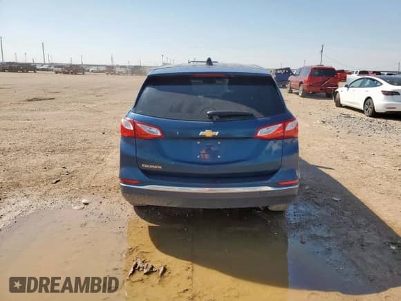 2021 Chevrolet Equinox LT с VIN 2GNAXJEV2M6137715, выставлен на аукционе Copart как лот 71084975 с пробегом 107 572 миль миль и Списание • Salvage title. История ставок и продаж доступна на DreamBid. Изображение 6.