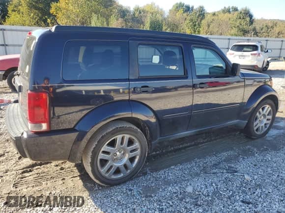 2011 Dodge Nitro Heat with VIN 1D4PT4GK2BW528503, listed as a Copart auction lot 90863585 with 121,569 mi miles and Clean title. Bid and sale history available at DreamBid. Image 3.