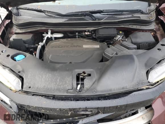 2019 Honda Passport Touring with VIN 5FNYF7H92KB000356, listed as a Copart auction lot 69598615 with 27,658 mi miles and Salvage title. Bid and sale history available at DreamBid. Image 12.