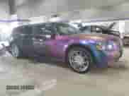 2005 Dodge Magnum SE with VIN 2D4FV48T25H161344, listed as a Copart auction lot 68303715 with 95,064 mi miles and Salvage title. Bid and sale history available at DreamBid. Image 4.