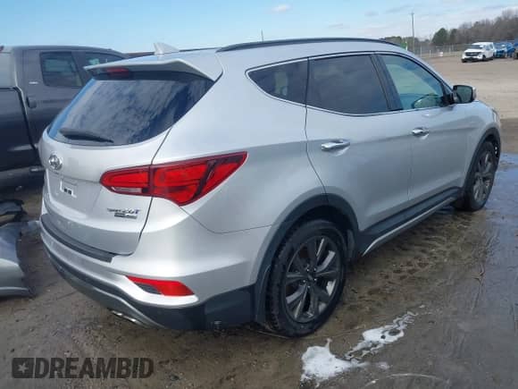 2018 Hyundai Santa Fe Ultimate с VIN 5XYZWDLA8JG518676, выставлен на аукционе IAAI как лот 41402511 с пробегом 107 551 миль миль и . История ставок и продаж доступна на DreamBid. Изображение 4.
