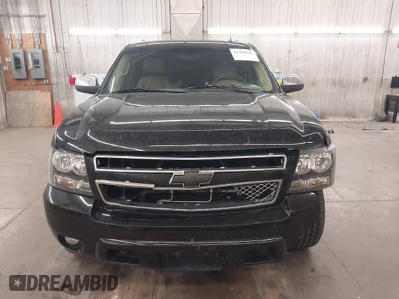 2010 Chevrolet Tahoe LTZ with VIN 1GNUKCE01AR179983, listed as a IAAI auction lot 42459947 with 181,127 mi miles and . Bid and sale history available at DreamBid. Image 13.