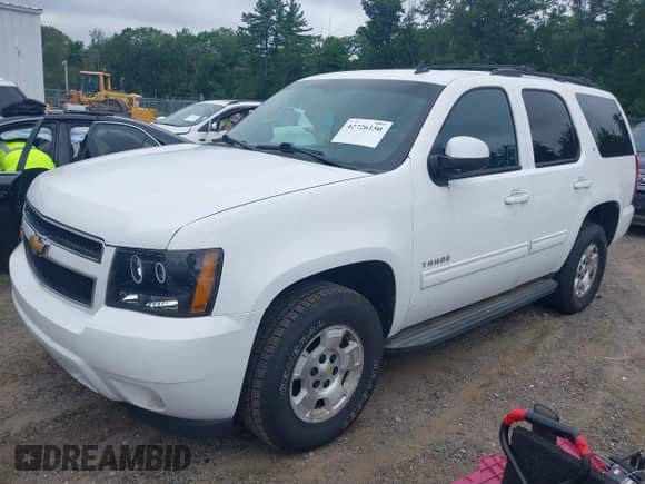 2013 Chevrolet Tahoe LT with VIN 1GNSKBE00DR197607, listed as a IAAI auction lot 42726150 with 196,009 mi miles and . Bid and sale history available at DreamBid. Image 18.