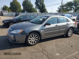 2013 Chrysler 200 Touring with VIN 1C3CCBBG7DN732021, listed as a Copart auction lot 80706505 with 157,045 mi miles and Salvage title. Bid and sale history available at DreamBid. Image 1.