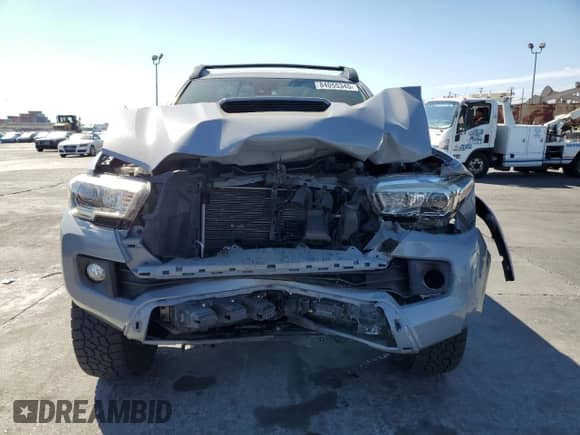 2018 Toyota Tacoma TRD Sport with VIN 3TMAZ5CNXJM074796, listed as a Copart auction lot 84055345 with 79,231 mi miles and Salvage title. Bid and sale history available at DreamBid. Image 5.