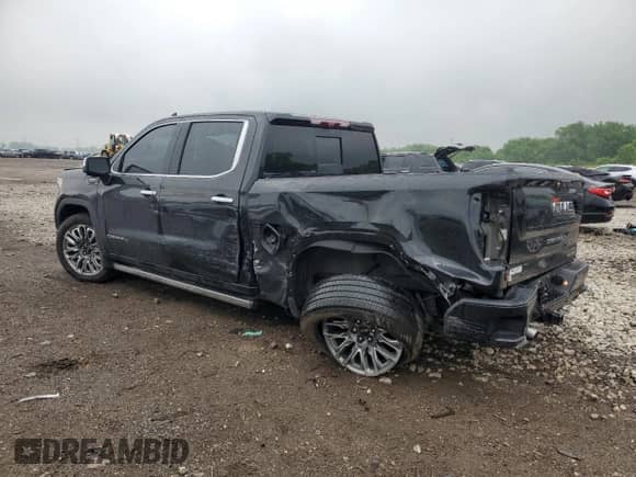 2024 GMC Sierra 1500 Denali Ultimate with VIN 1GTUUHEL3RZ368981, listed as a Copart auction lot 61587665 with 7,713 mi miles and Salvage title. Bid and sale history available at DreamBid. Image 2.