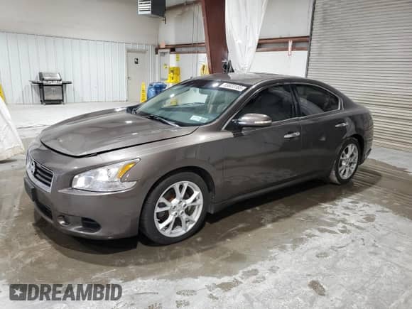 2014 Nissan Maxima SV z VIN 1N4AA5AP1EC488543, wystawiony jako Copart lot #83833185 z przebiegiem 79 767 mil mil oraz Szkoda całkowita • Salvage title. Historia ofert i sprzedaży dostępna na DreamBid. Obrazek 1.