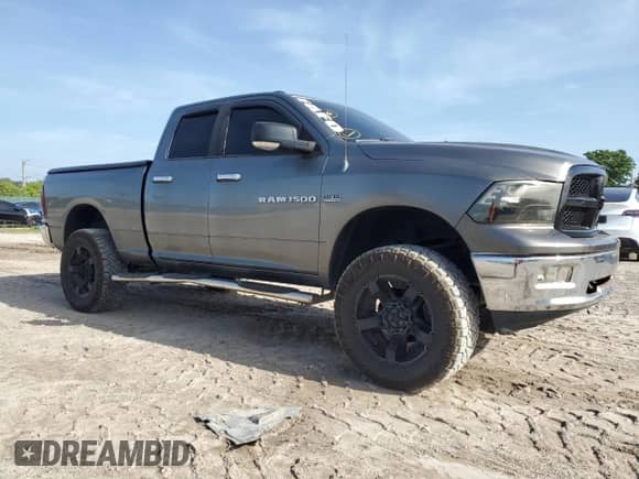 2011 Ram 1500 Big Horn with VIN 1D7RB1GT6BS515329, listed as a Copart auction lot 69392895 with 165,902 mi miles and Salvage title. Bid and sale history available at DreamBid. Image 4.